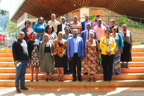 Prof. Dionysious Kiambi with students